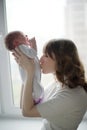 Young mother with crying baby Royalty Free Stock Photo