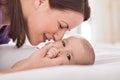 Young mother cuddling her gentle baby Royalty Free Stock Photo