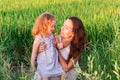 Young Mother and daugther Hug near rice field, nature, travel