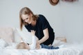Young mother does massage baby on bed, stretching for girls. Health concept yourself
