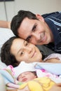 Young mother and father with their newborn baby girl at the hospital on the day of her birth. Family concept. Parenthood concept Royalty Free Stock Photo