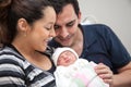 Young mother and father with their newborn baby girl at the hospital on the day of her birth. Family concept. Parenthood concept Royalty Free Stock Photo