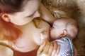 A young mother feeds the baby. breast feeding. health. food. immunity Royalty Free Stock Photo