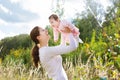 Young mother with her baby daughter in sunny Royalty Free Stock Photo