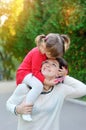 Young mother and her cute girl have fun in autumn vineyard Royalty Free Stock Photo