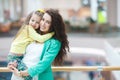 Young mother and her daughter doing shopping together Royalty Free Stock Photo