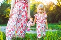 Mom and daughter are walking in the park Royalty Free Stock Photo