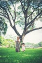 Young mother and her little daughter walking Royalty Free Stock Photo