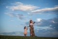 Young mother and her little daughter walking Royalty Free Stock Photo