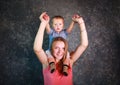 Young mother with her little son in arms happy together Royalty Free Stock Photo