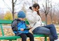 Young mother with her son in the park Royalty Free Stock Photo