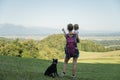 Young mother and her toddler looking at beautiful view of the hills Royalty Free Stock Photo