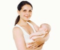 Young mother holding on the hands a sleeping baby Royalty Free Stock Photo