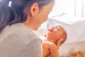 Young mother holding her little newborn baby girl Royalty Free Stock Photo