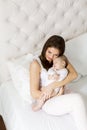 Young mother holding her newborn daughter Royalty Free Stock Photo