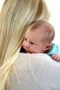 Young Mother Holding Newborn Baby Over Shoulder Royalty Free Stock Photo