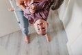 young mother at home playing with her adorable one year old baby girl. family time Royalty Free Stock Photo