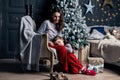 Young mother hugs daughter in pajamas holding her in her arms Royalty Free Stock Photo