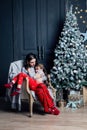 Young mother hugs daughter in pajamas holding her in her arms Royalty Free Stock Photo