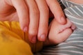 Young mother, kissing her baby boy at home. Family concept. Closeup portrait of loving mother young woman kissing little Royalty Free Stock Photo