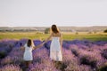 Young Mother and Little Daughter on Lavender Field