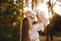 Young mother playing with her baby. Mom and son walking in a park. happy mom playing with her son. Mother`s Day. happy parents. Royalty Free Stock Photo