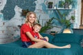 Young mother plays and hugs her son. Day off at home, a smile on your face. Growing up a child Royalty Free Stock Photo