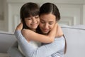 Young mother and small daughter hug showing love Royalty Free Stock Photo