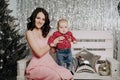 Young mother and son. Woman and newborn baby boy Royalty Free Stock Photo