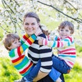 Young mother and two little twins boys having fun Royalty Free Stock Photo