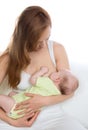 Young mother woman breastfeeding her child baby infant girl Royalty Free Stock Photo