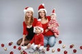 Young mothers with children in Christmas hats