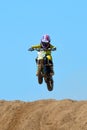 Young motocross rider jumping Royalty Free Stock Photo