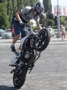 Young motorbiker performing stunts on his tuned bike