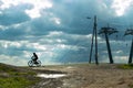 The young mountain biker silhouette on the sunset Royalty Free Stock Photo