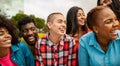 Young multi ethnic friends having fun together hanging out in the city Royalty Free Stock Photo