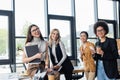 young multicultural businesswomen smiling at camera Royalty Free Stock Photo