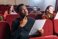 Young multiethnic actors reading scripts in Royalty Free Stock Photo