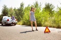 Young multiethnic international couple traveling on the car in sunny day Royalty Free Stock Photo