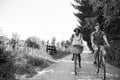 Young multiethnic couple having a bike ride in nature Royalty Free Stock Photo