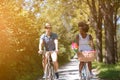 Young multiethnic couple having a bike ride in nature Royalty Free Stock Photo