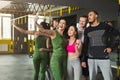 Young multiethnic group making selfie at gym Royalty Free Stock Photo