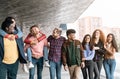 Young multiracial friends having fun together hanging out in the city Royalty Free Stock Photo