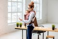 Businesswoman with her baby son at the office Royalty Free Stock Photo