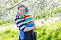 Young mum and little kid boy in blooming garden Royalty Free Stock Photo