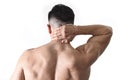 Young muscular sport man holding sore neck massaging cervical area suffering body pain Royalty Free Stock Photo