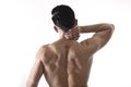 Young muscular sport man holding sore neck massaging cervical area suffering body pain Royalty Free Stock Photo