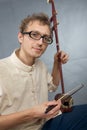 Young musician playing in erhu.