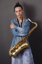 Young musician with saxophone Royalty Free Stock Photo