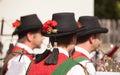 Young musician in typical costume during an autumn local celebration in Val di Funes South Tyrol